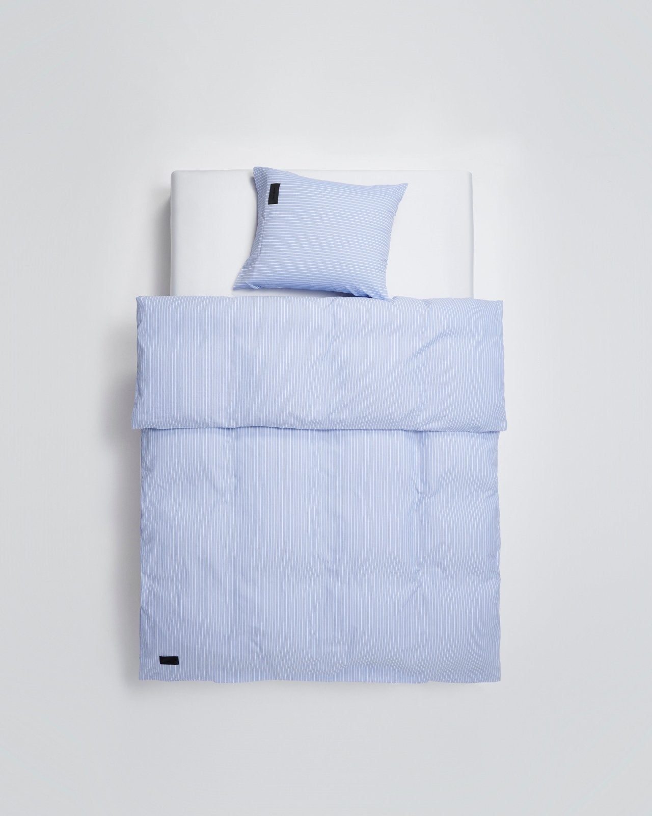 Wall Street pillow case - Stripe light blue Oxford Bedwear by Magniberg